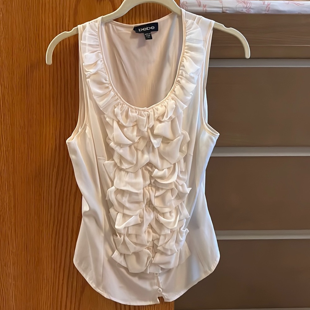 Bebe cream colored silk tank top in size xs